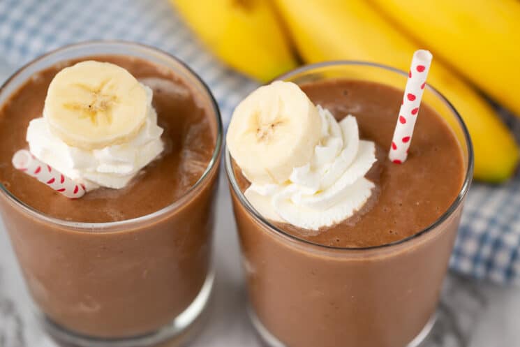 two glasses of chocolate banana smoothie
